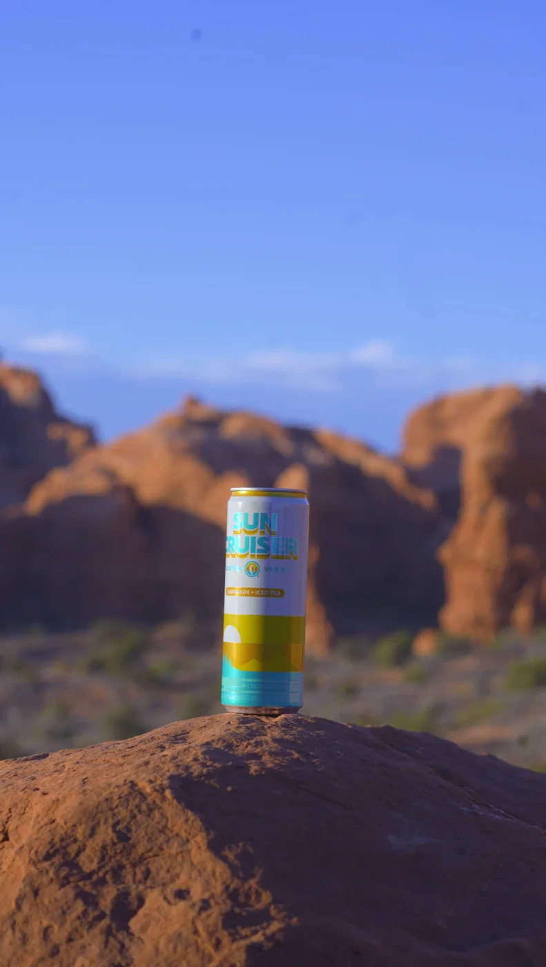 Sun Cruiser can on red rock in the desert